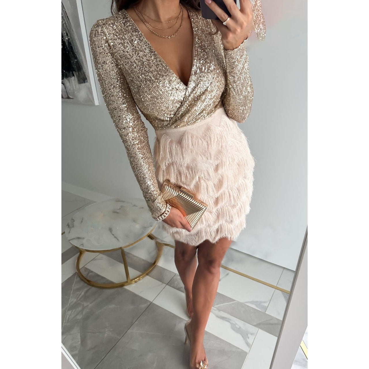 Dress with sequins and ruffles